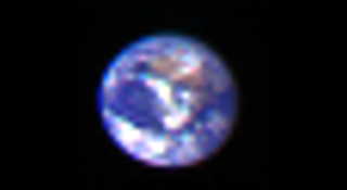 Illustration for article titled A Stunning Shot Of Our Pale Blue Dot Rising Over The Lunar Horizon